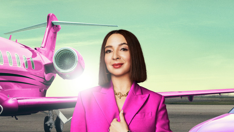 Molly speaking at a brightly lit public charity event