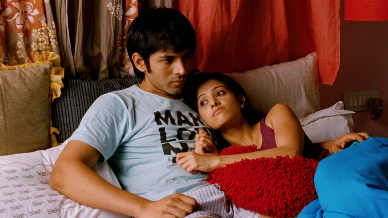 A tense moment in the film, where the male leads sit in a dimly lit room, their expressions a mix of frustration and exhaustion.