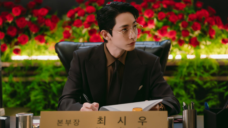 The cramped, cluttered reality of the webtoon office, standing in stark contrast to the digital void.