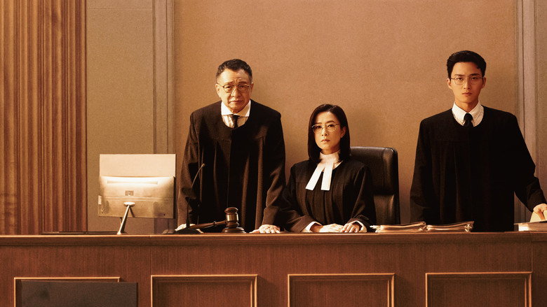 A tense, quiet moment between Judge Yin Wai-chi and her colleagues in the sterile, dimly lit chambers