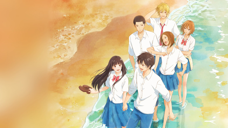 Sawako standing alone at the edge of the schoolyard, her long hair partially covering her face, as other students walk by without looking at her.