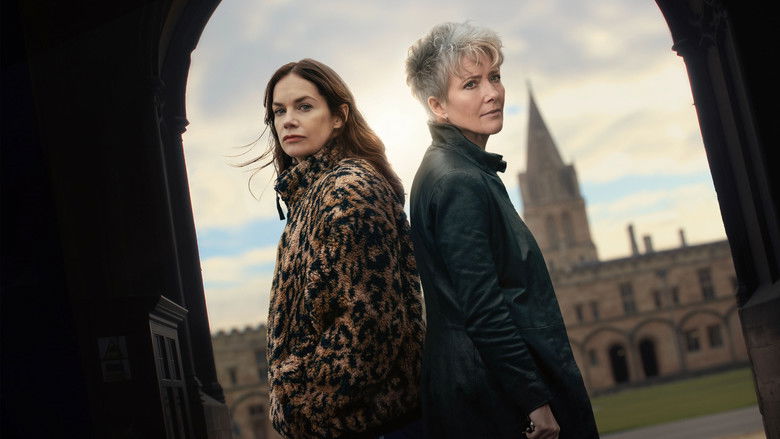 Sarah and Zoë analyzing a clue in a dimly lit room