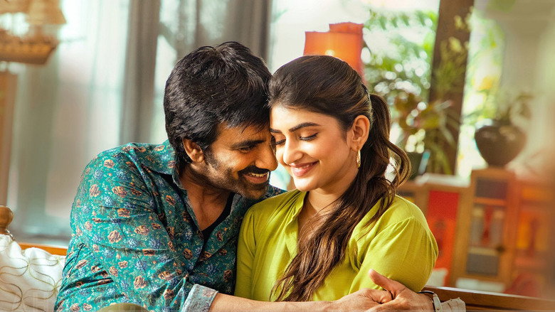 A split-screen shot captures Ravi Teja as both Swamy and Anand, their expressions mirroring confusion and amusement
