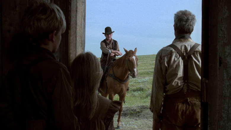 William Munny standing in the rain, confronting the consequences of his actions