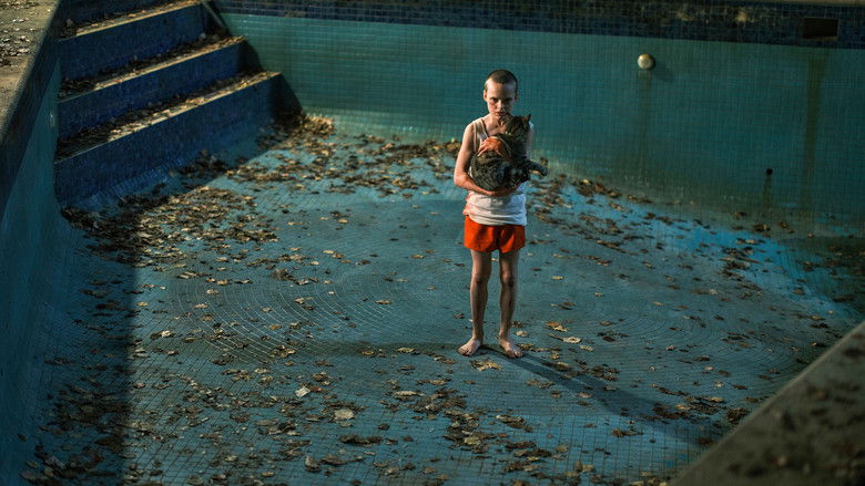 Laura staring blankly across the dinner table