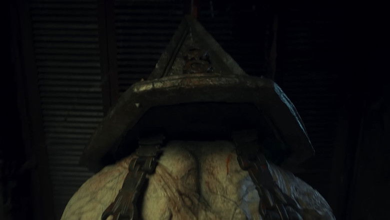 A grotesque monster emerging from the darkness