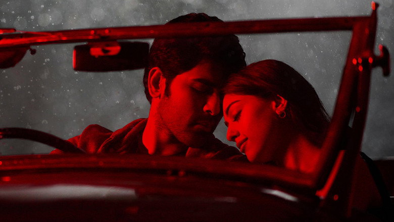 A tense moment between the leads, their expressions caught between frustration and longing