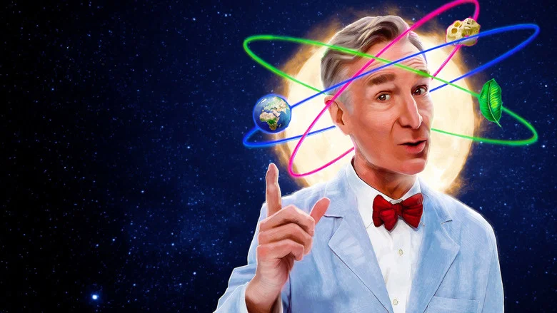 Bill Nye stands in a brightly lit studio, surrounded by a diverse panel of guests, all facing the camera as if ready for a debate.
