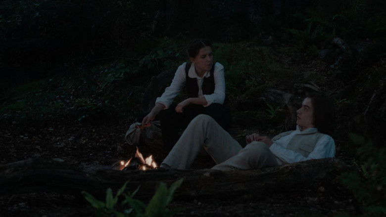 Enola standing in front of a sprawling Victorian estate, looking thoughtful