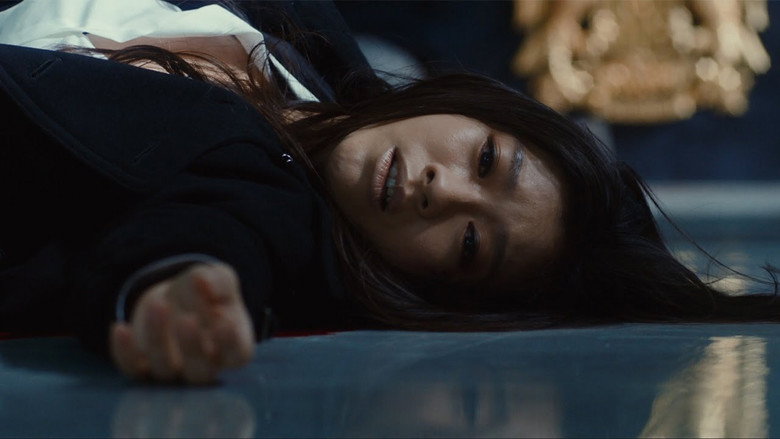 Yukihira standing in the rain, a lone figure against the neon glow