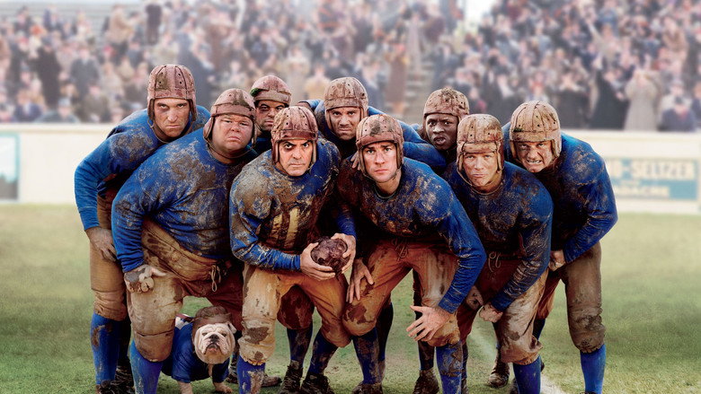 A chaotic football game in the 1920s, with players in leather helmets colliding mid-play