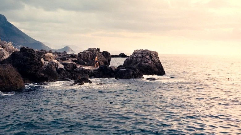 A serene yet imposing architectural structure reflecting the film's grand scale