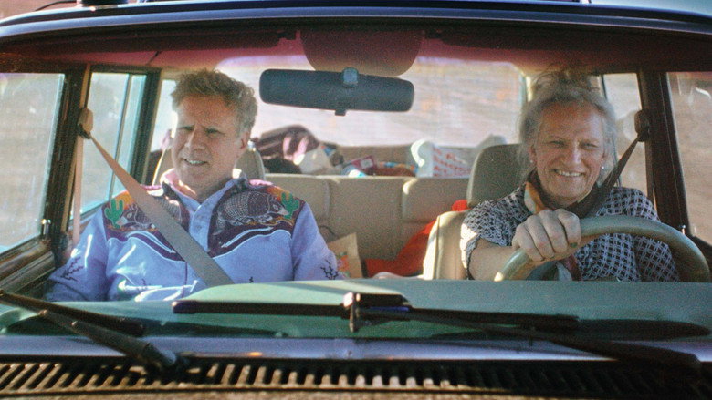 Will Ferrell and Harper Steele sit side by side in a car, the open road stretching behind them, their faces lit by the soft glow of dashboard lights.