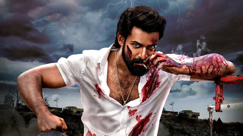 A wide shot of Rudra standing in the middle of a chaotic street brawl, dust swirling around him as he clutches a makeshift weapon