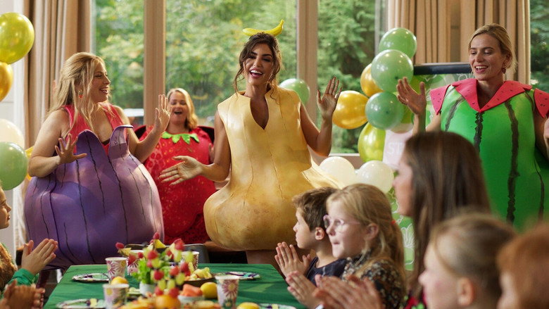 A group of parents sit in a circle, their expressions a mix of exhaustion and forced cheer, as they navigate a "Moms for Moms" support group.