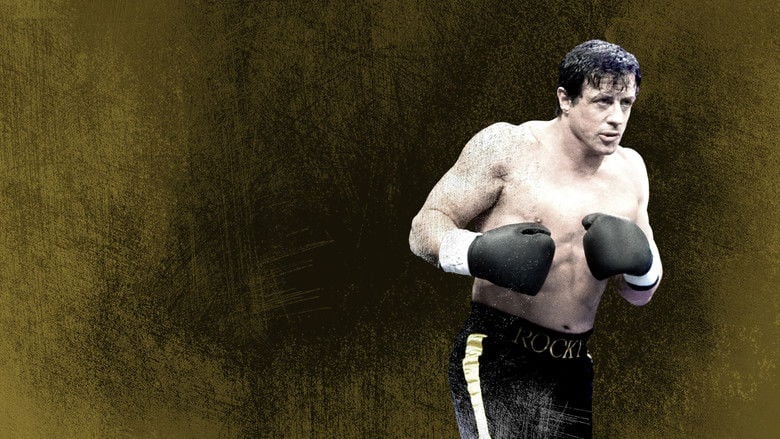 Rocky stands alone in a cemetery, his shadow stretching long over Adrian’s grave, the Philadelphia skyline blurred in the distance.