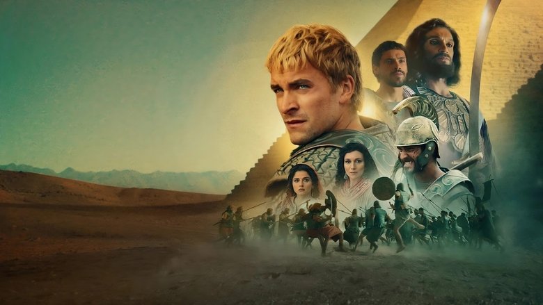 Alexander stands before his troops, the golden light of dawn casting long shadows across the battlefield