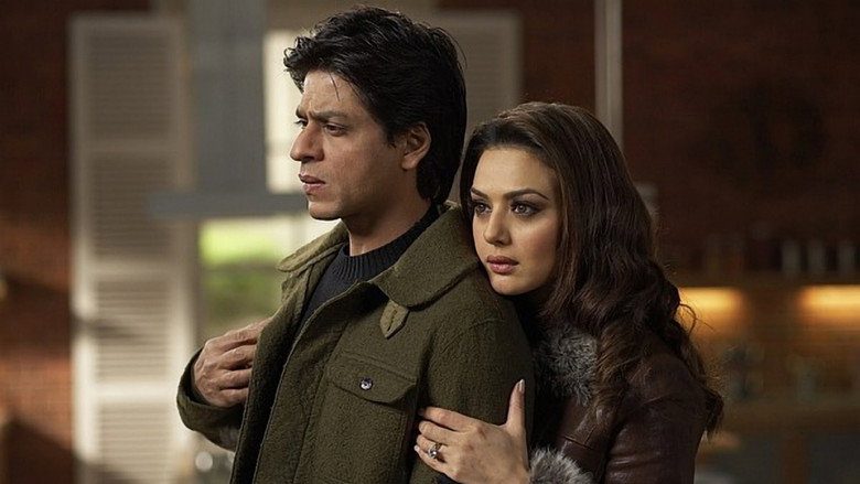 A dimly lit New York apartment, where Dev (Shah Rukh Khan) and Maya (Rani Mukerji) sit on opposite ends of a couch, the city’s glow bleeding through the windows like a bruise.