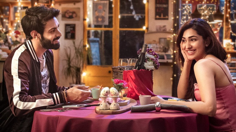 A moment of playful tension between Varun and Sia, their faces lit with the warm glow of a café at dusk