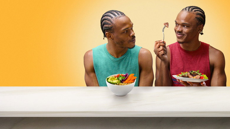 A split-screen shot of two identical twins preparing meals in their respective kitchens—one chopping vegetables, the other grilling meat.
