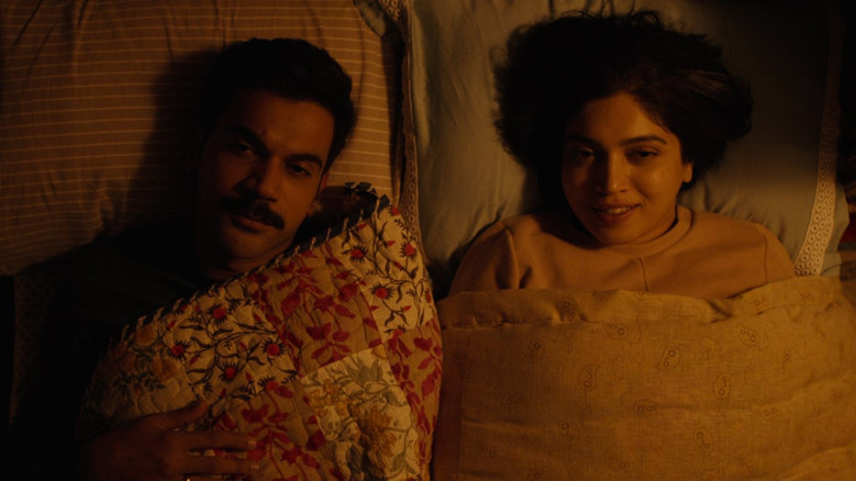 A tense negotiation over tea, Shardul and Suman sitting across from each other, their expressions a mix of wariness and reluctant amusement.