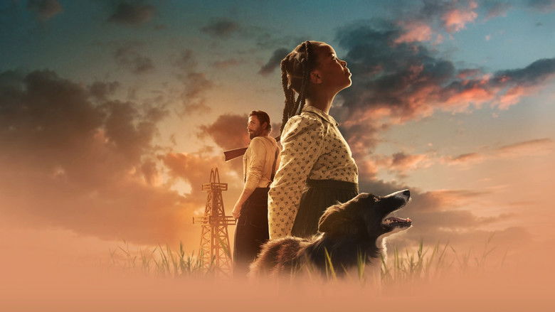 A wide shot of the dusty Oklahoma landscape at dusk