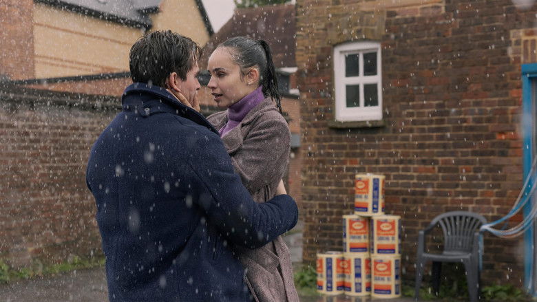 A quiet moment of reflection between the two leads