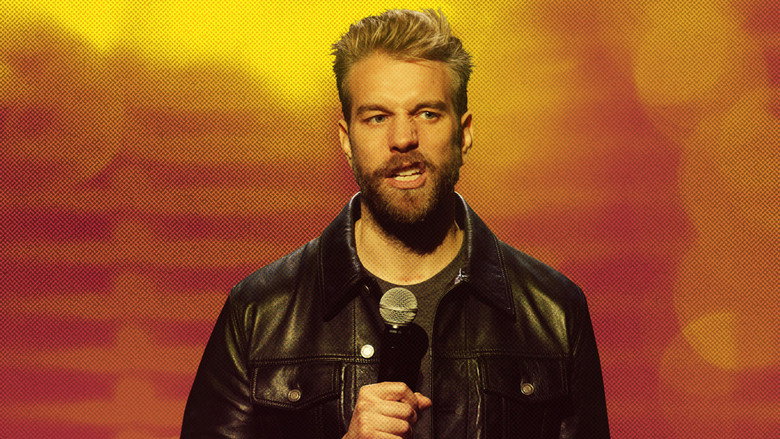 Jeselnik on stage, bathed in a single spotlight, his face a mask of deadpan amusement