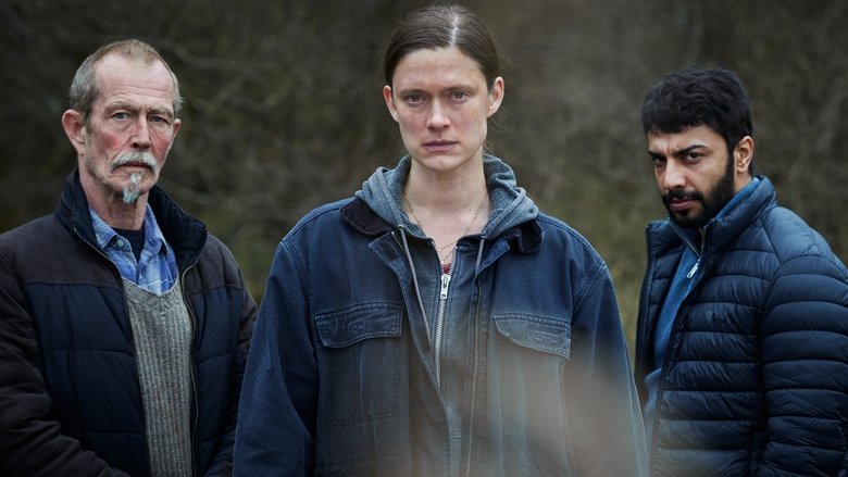 Dani standing in the stark Swedish countryside