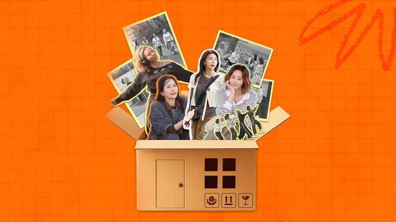 The interior of the warmly lit modular home at dusk