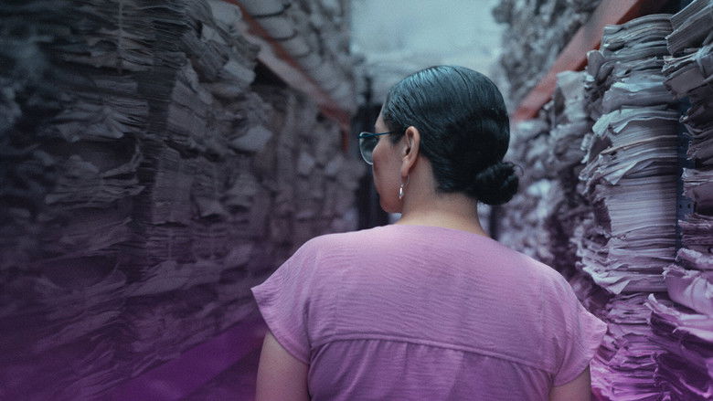 A somber, dimly lit office corridor in Mexico City