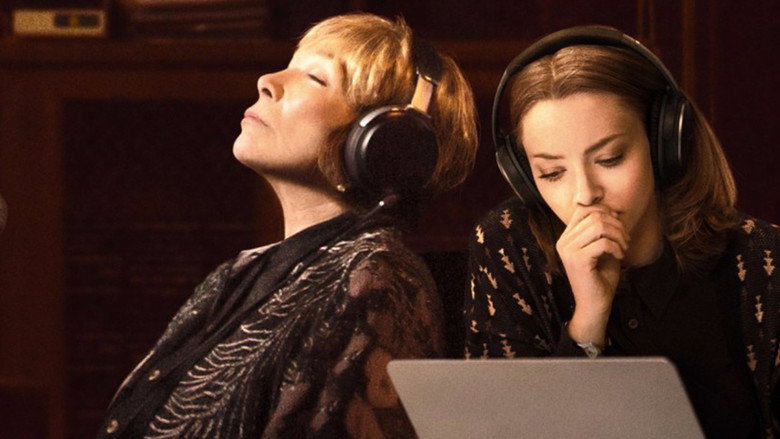 A close-up of Shirley MacLaine’s face, half in shadow, her expression caught between defiance and something softer, almost vulnerable.