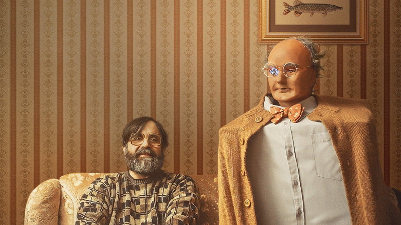 Brian and Charles in the cottage, surrounded by half-built inventions