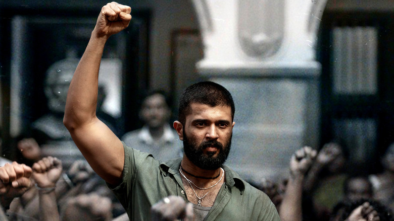A dimly lit prison cell, where Suri first confronts the weight of his mission, the camera lingering on his clenched fists and the shadows stretching across the wall.