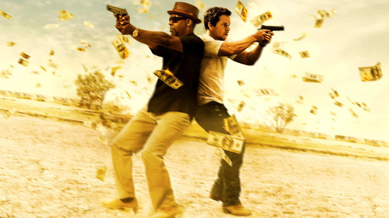 Denzel Washington and Mark Wahlberg in a tense standoff, guns drawn, surrounded by the chaos of a shootout.