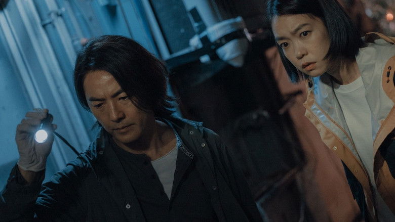 The eerie, smiling mask of Baba the Witch appearing on a smartphone screen