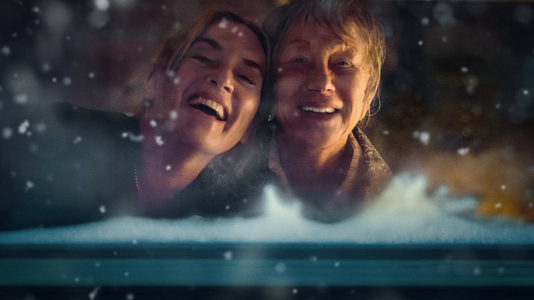 Timothy Spall and Kate Winslet in a tense hallway conversation