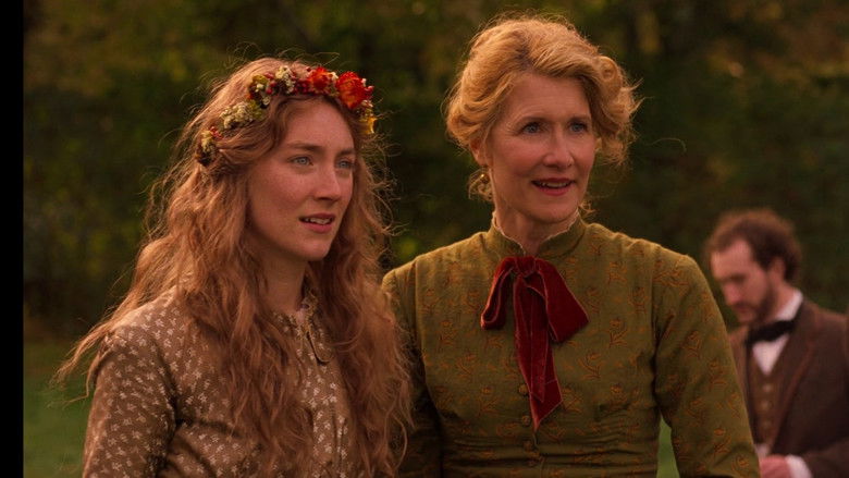 Amy March painting, surrounded by canvases, exuding a quiet, ambitious intensity