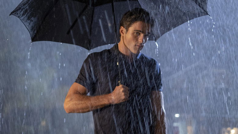 The ensemble cast in dramatic lighting