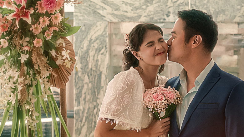 A tense moment between the couple against a tropical backdrop