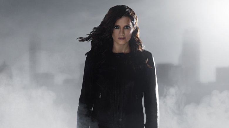 Emily inside the glass water tank