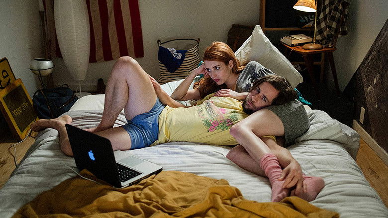 A quiet moment between Owen and Hallie, their faces half-lit by the glow of a bedside lamp, the tension between them palpable even in stillness.