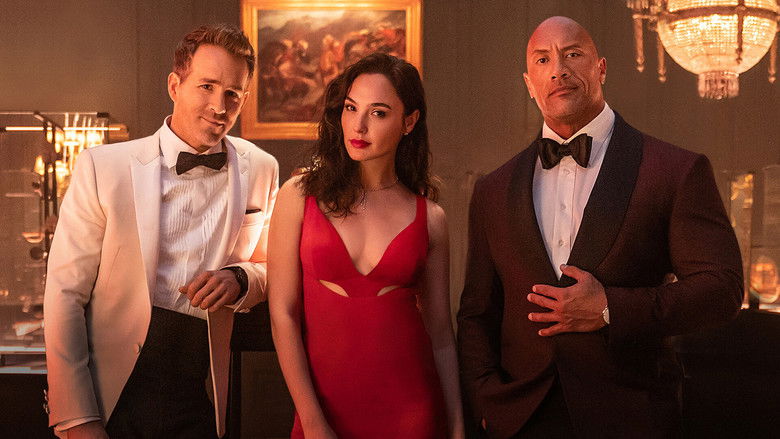 Gal Gadot in a red dress looking elegant and dangerous