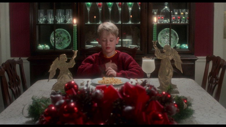 Kevin setting up traps in the house