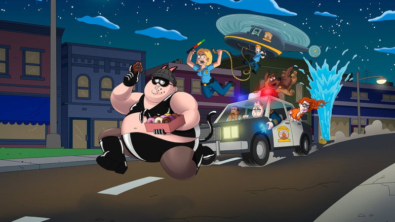 Bullet the dog, looking menacing yet hilarious in tactical gear.