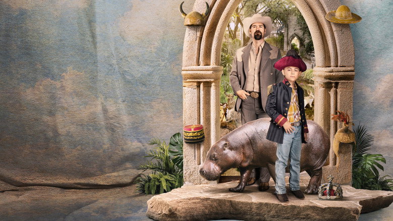 A child stands in a cluttered room filled with taxidermy and hats, his small frame dwarfed by the opulence around him.