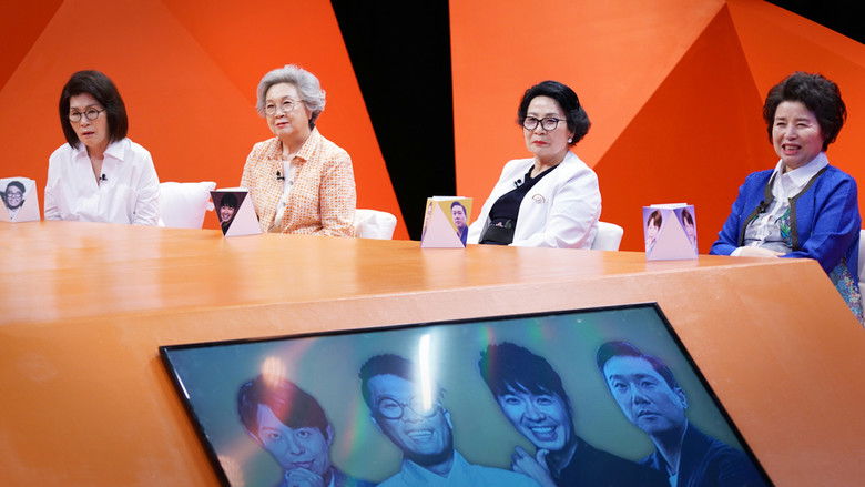 The mothers watching the studio monitors with varying degrees of concern