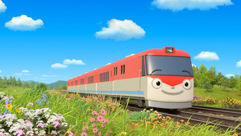 A 3D-rendered train with large, expressive eyes, looking determined as it chugs along a track surrounded by lush greenery.