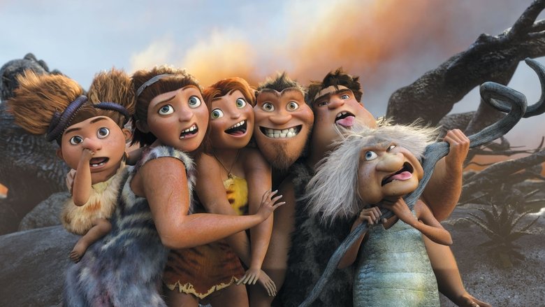 The Croods family huddled inside their dark cave, staring at the small opening