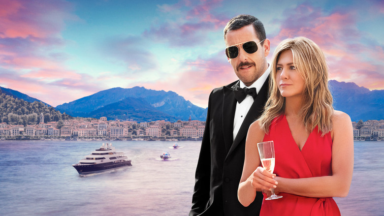 Audrey and Nick Spitz stand on the deck of a luxury yacht, surrounded by wealthy suspects in evening wear, the Mediterranean twilight casting long shadows.